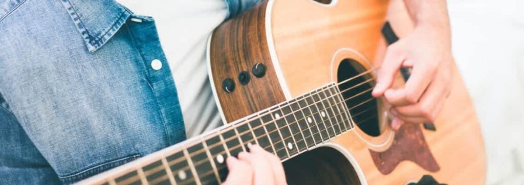 Best Acoustic Guitar For Gigging: Top Picks For Unforgettable Performances Should I Get A Wide-Neck Guitar