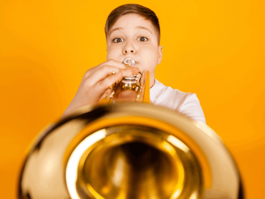 child playing a trumpet