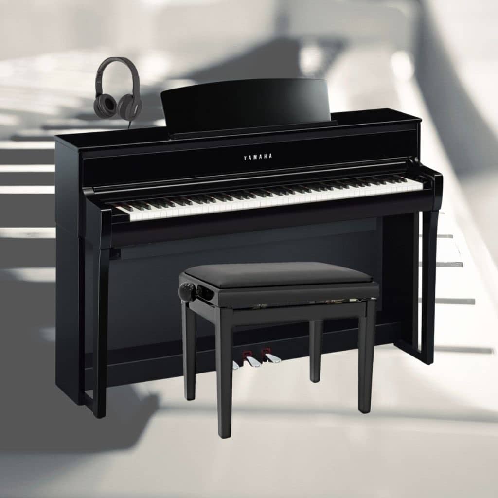 A Yamaha Clavinova Clp 775 With A Matching Bench And Music Stand
