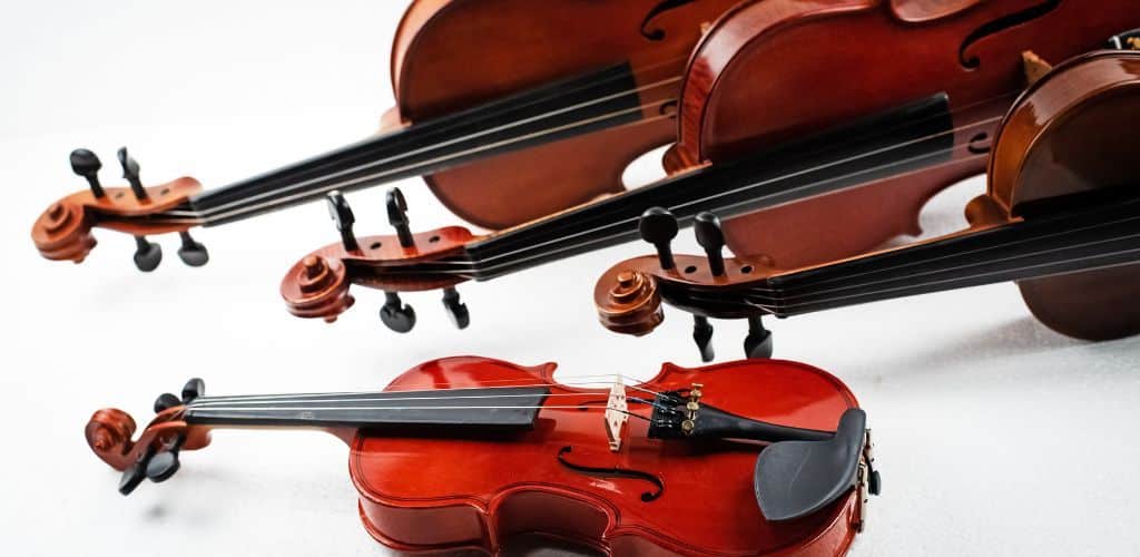 Violin Size For Adults: Find Your Perfect Fit! A Photo Of Violins With Different Sizes