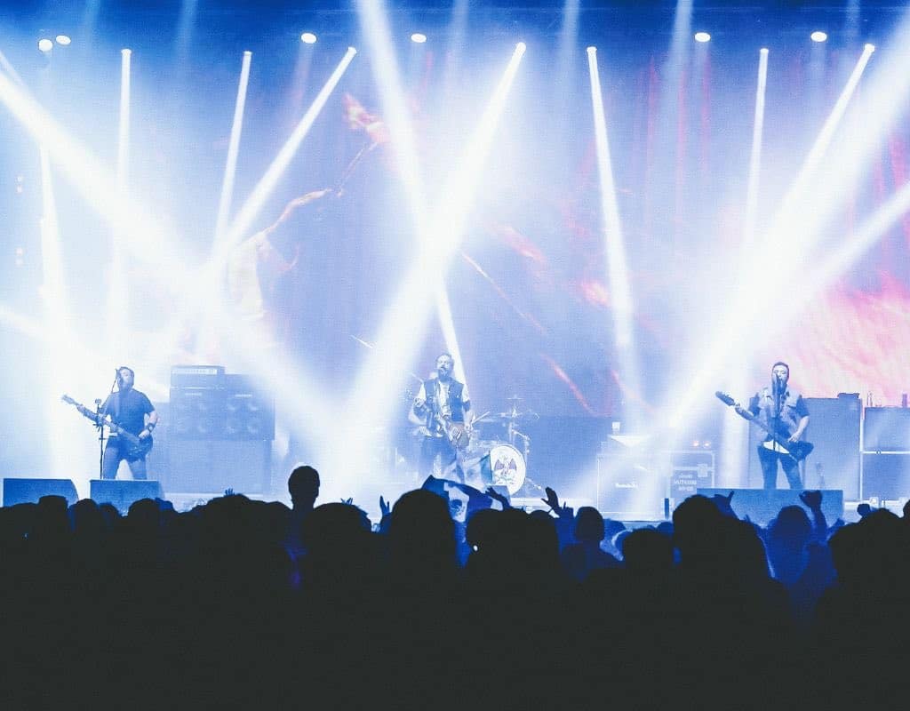 How The Electric Guitar Revolutionized Pop Culture A Rock Band Performing On Stage