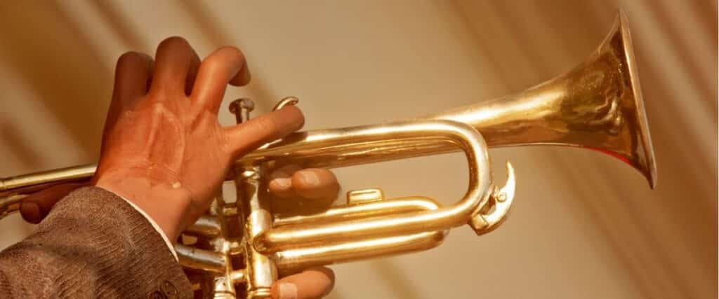 10 Crazy Trumpet Facts You Won’t Believe Until You Read Them! Trumpeter Playing Gold Brass Trumpet