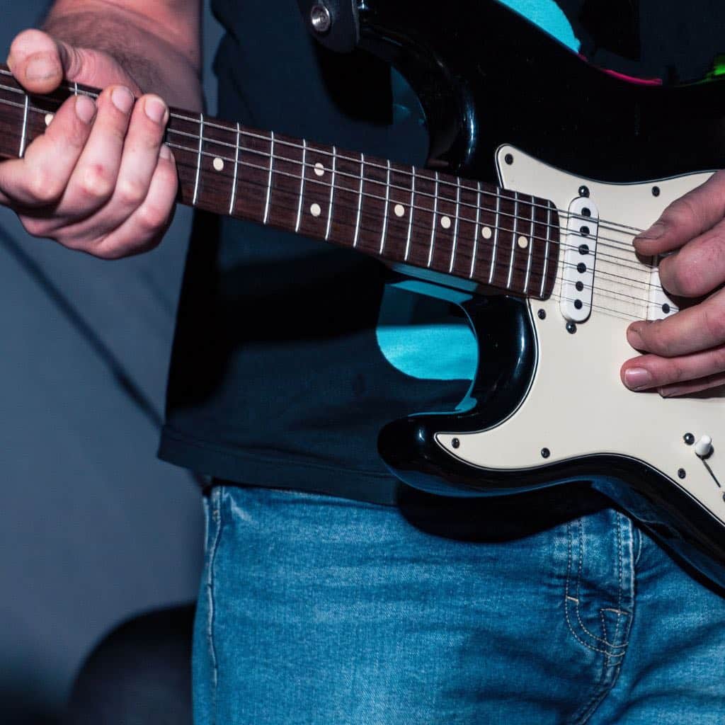 The Top 7 Craziest Myths About Electric Guitars—And Which Ones Are Actually True! A Photo Of A Left-Hand Guitarist
