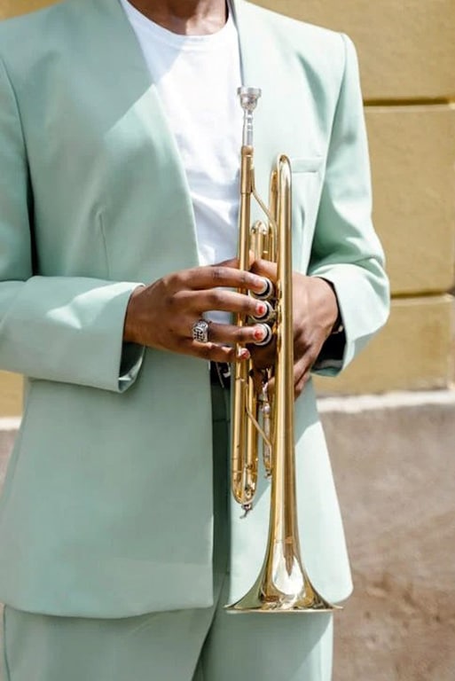 10 Crazy Trumpet Facts You Won’t Believe Until You Read Them! Man Holding A Trumpet
