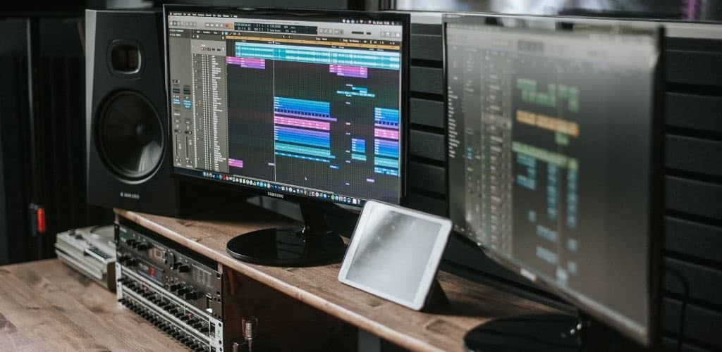 Pro Tools Interface: Master Your Audio Setup Effortlessly Two Computer Monitors Inside A Studio Setup Showing Daw Dashboard