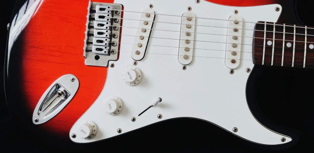 Stratocaster Review: Unveiling The Iconic Guitar'S Timeless Appeal A Body Of An Electric Guitar Showing The Strings And Pickup