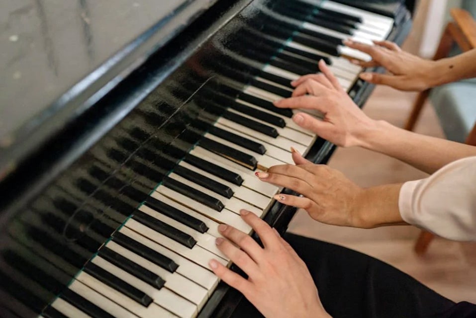 Couple Playing Piano