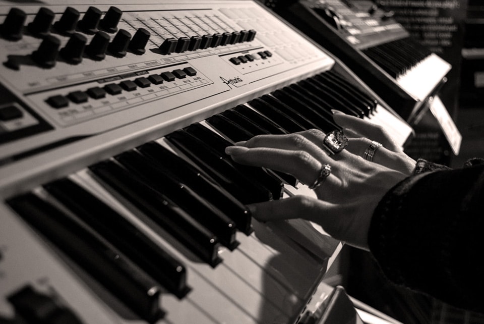 Person Playing Electric Piano