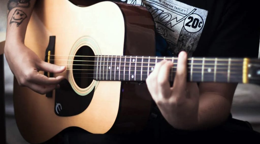 Playing Acoustic Guitar
