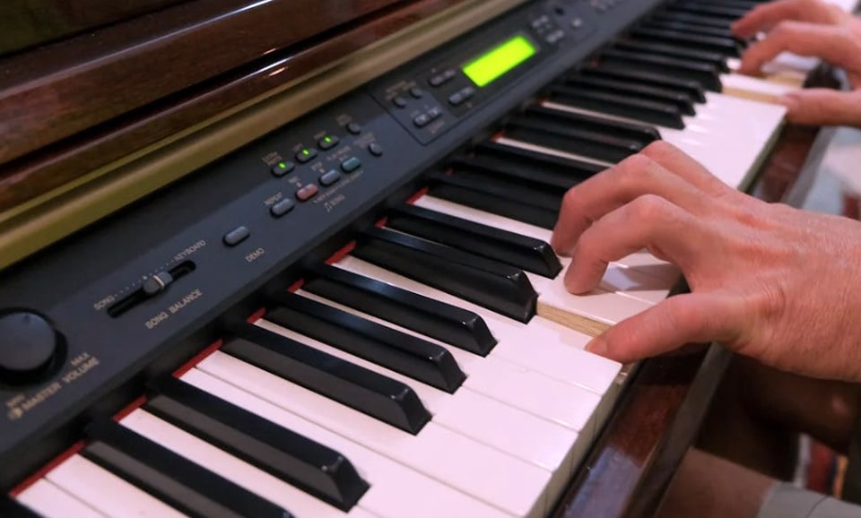 Playing An Old Electric Piano