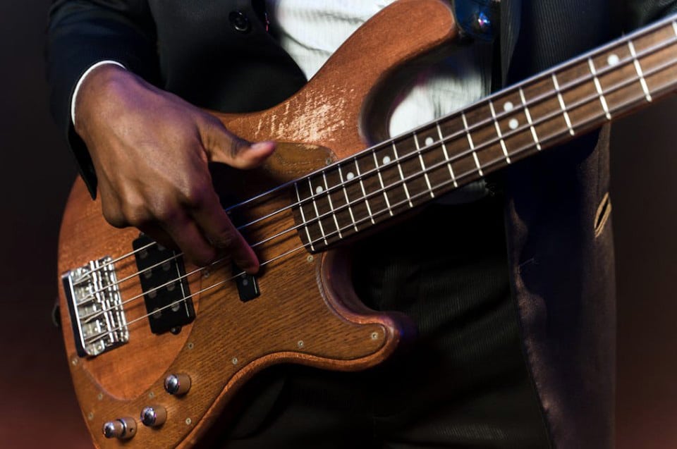 Person Playing An Electric Guitar