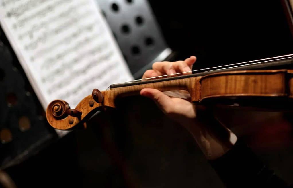 Person Playing Violin