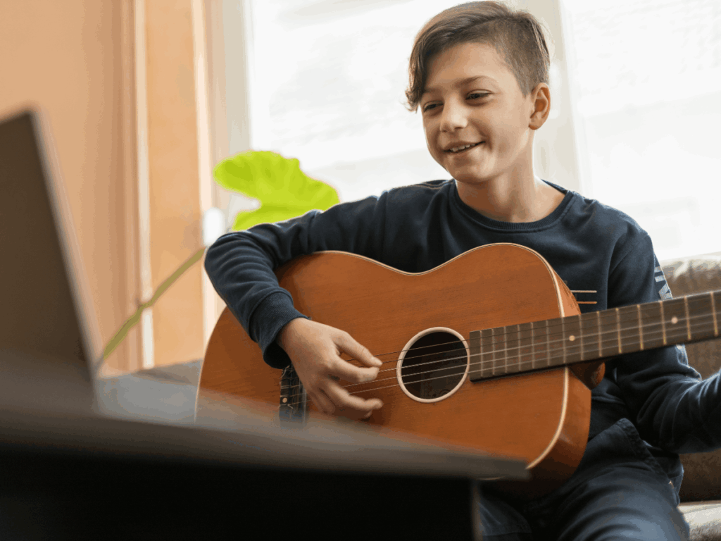 Kid Playing Acoustic Guitar