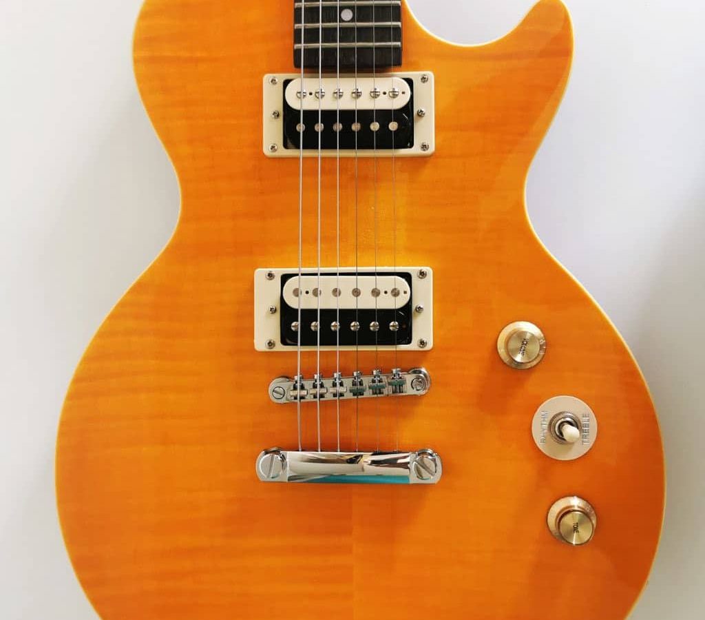 A Body Of An Orange Les Paul Electric Guitar A Body Of An Orange Les Paul Electric Guitar
