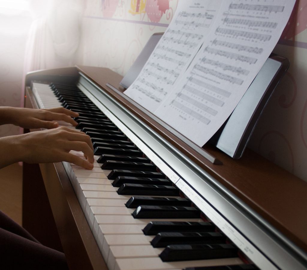A Pianist Playing A Digital Piano A Pianist Playing A Digital Piano