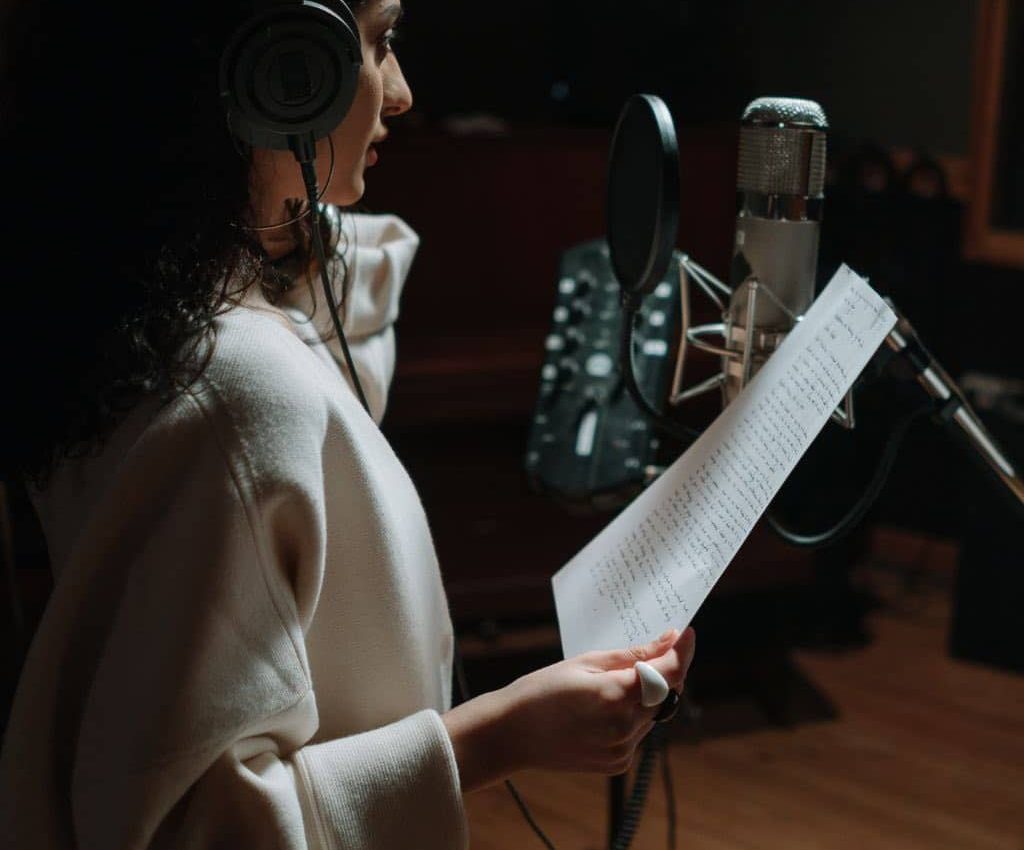 A Singer Inside A Recording Studio