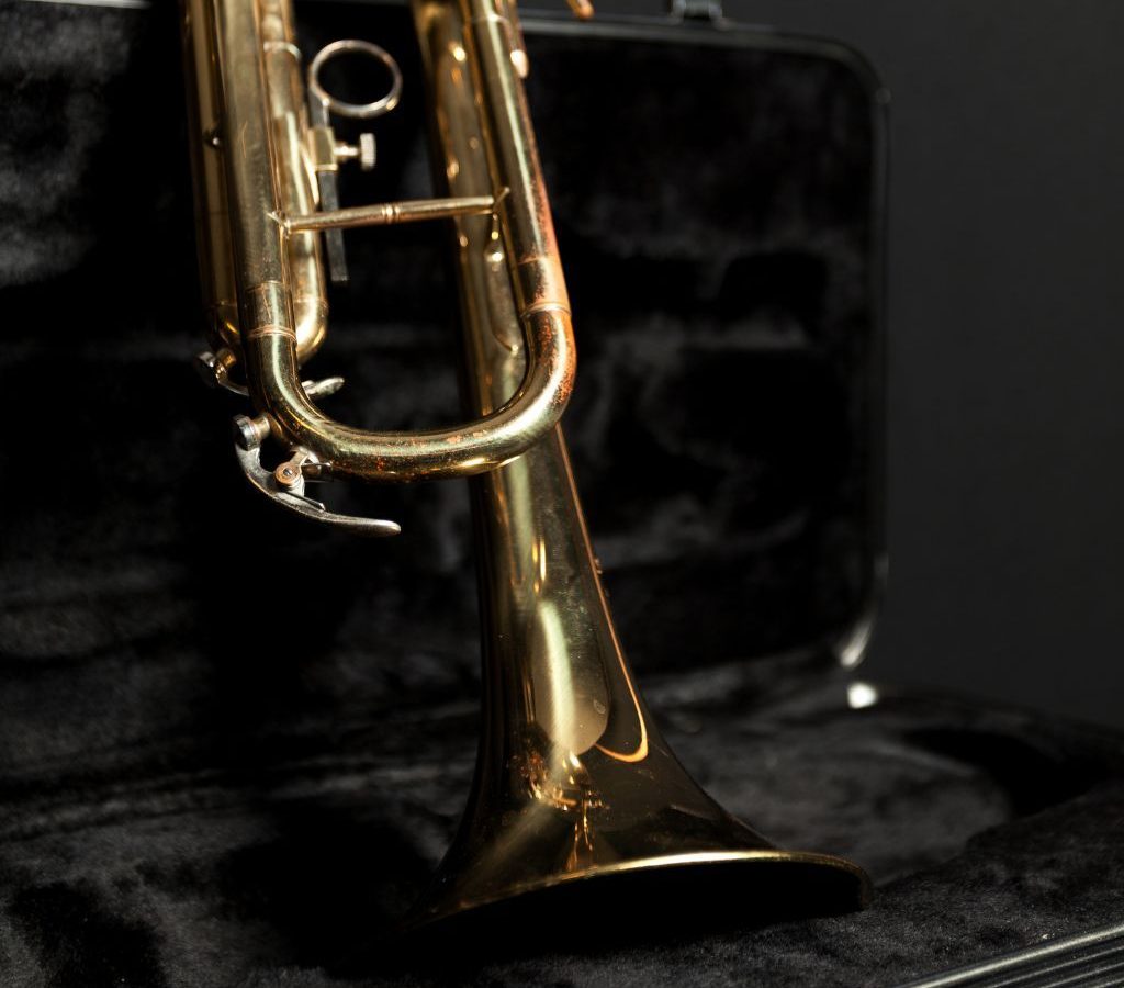 A Trumpet Resting On A Black Case A Trumpet Resting On A Black Case